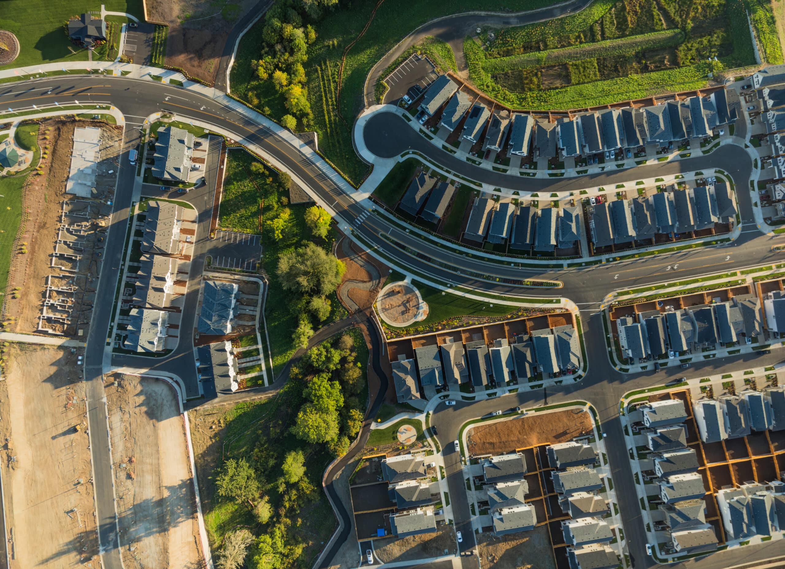 A residential area with many houses and a park