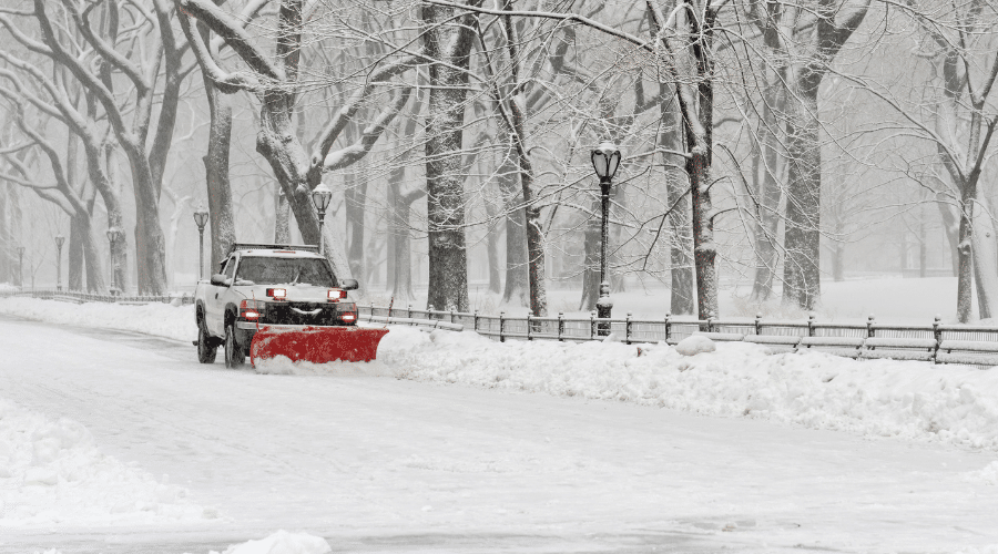 snowplow creating a snowpile that blocks pedestrian access to sidewalks or crossing the road