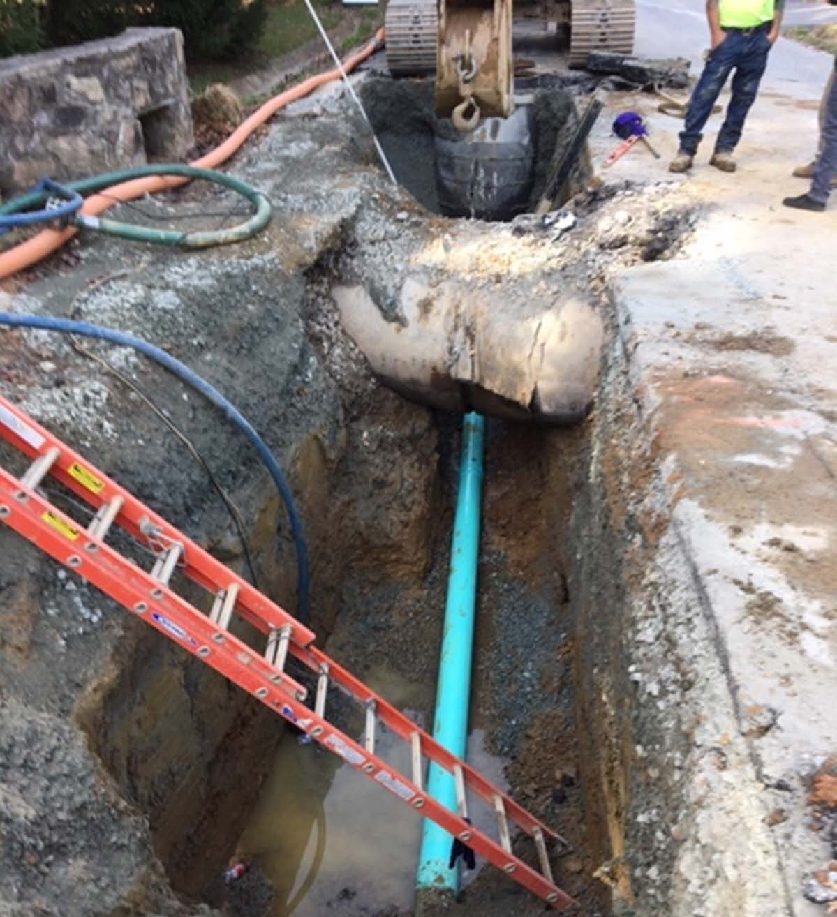 Installation of new 8” PVC under existing roadway culvert to replace deteriorated asbestos cement pipe sewers